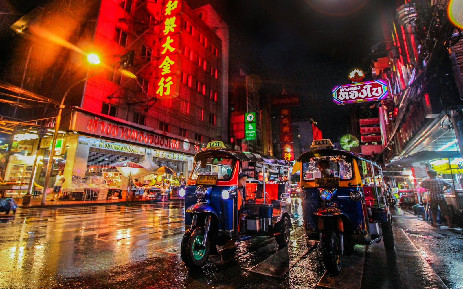 Tuk-tuks on a Bangkok street